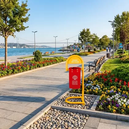 Sarı kırmızı te ayaklı park bahçe tipi dış mekan çöp kovası parkta
